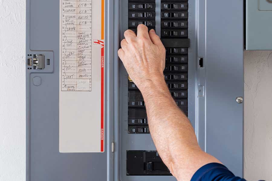 Residential electrical panel being inspected before replacement in Raleigh, NC