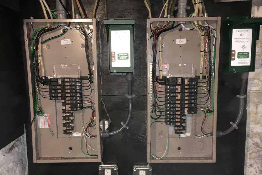 New whole house surge protectors connected to electrical panels in Raleigh, NC